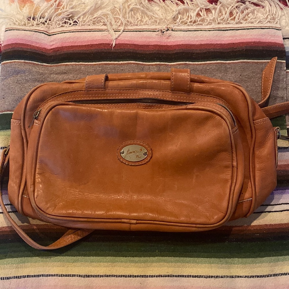 Vintage butter leather travel bag